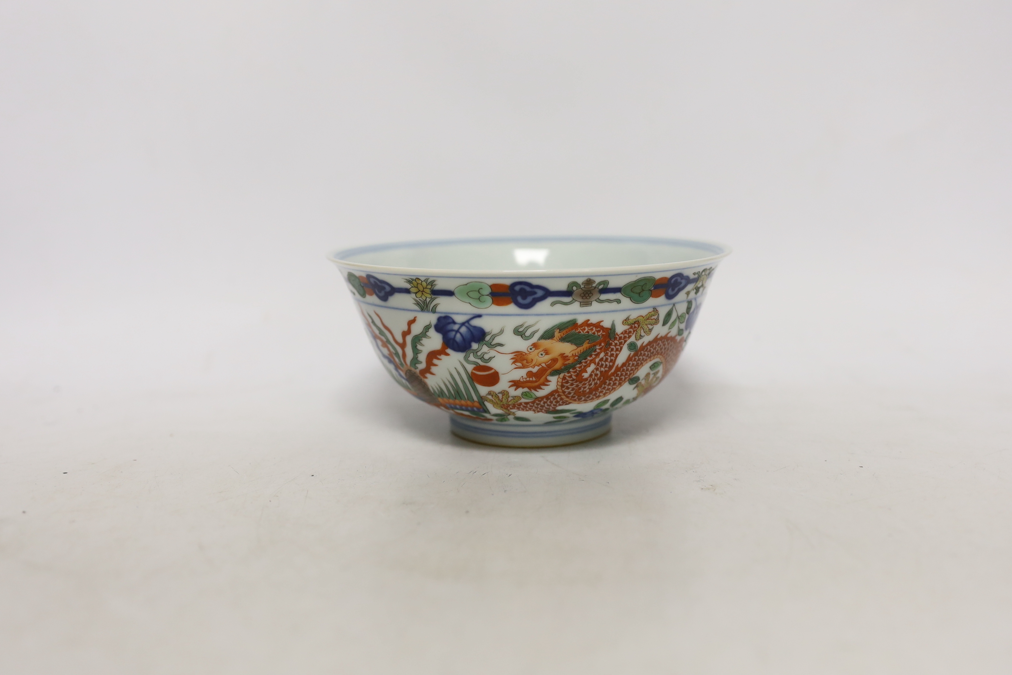 A Chinese wucai 'dragon & phoenix ' bowl, Qianlong mark but later, 16cm